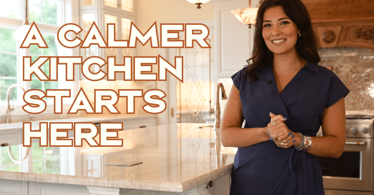 A smiling woman stands in a kitchen with the text A CALMER KITCHEN STARTS HERE